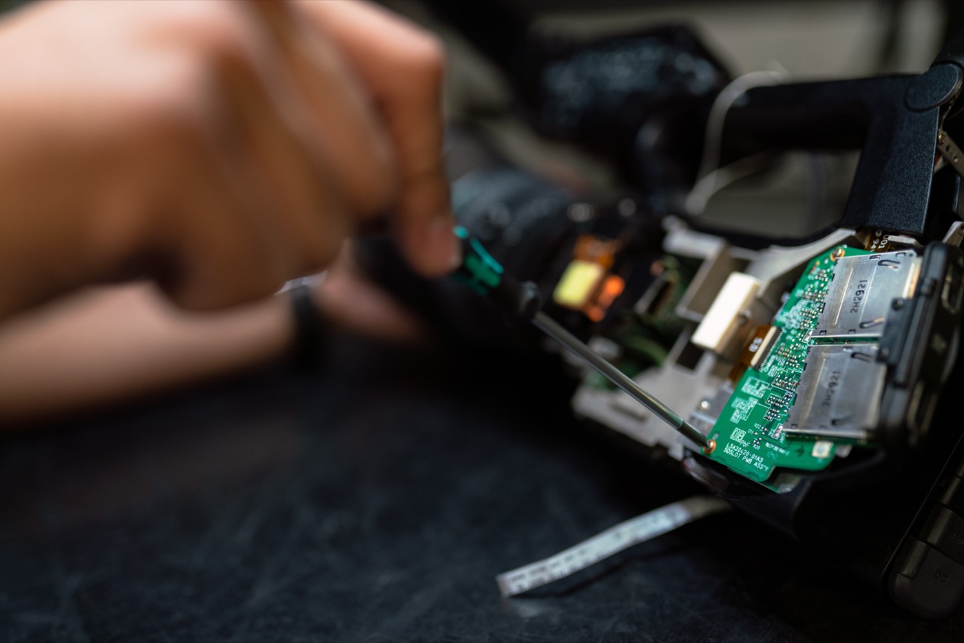 Technician working on electronic equipment